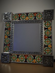 A beautiful Mexican tin mirror, available at The Latin Boutique